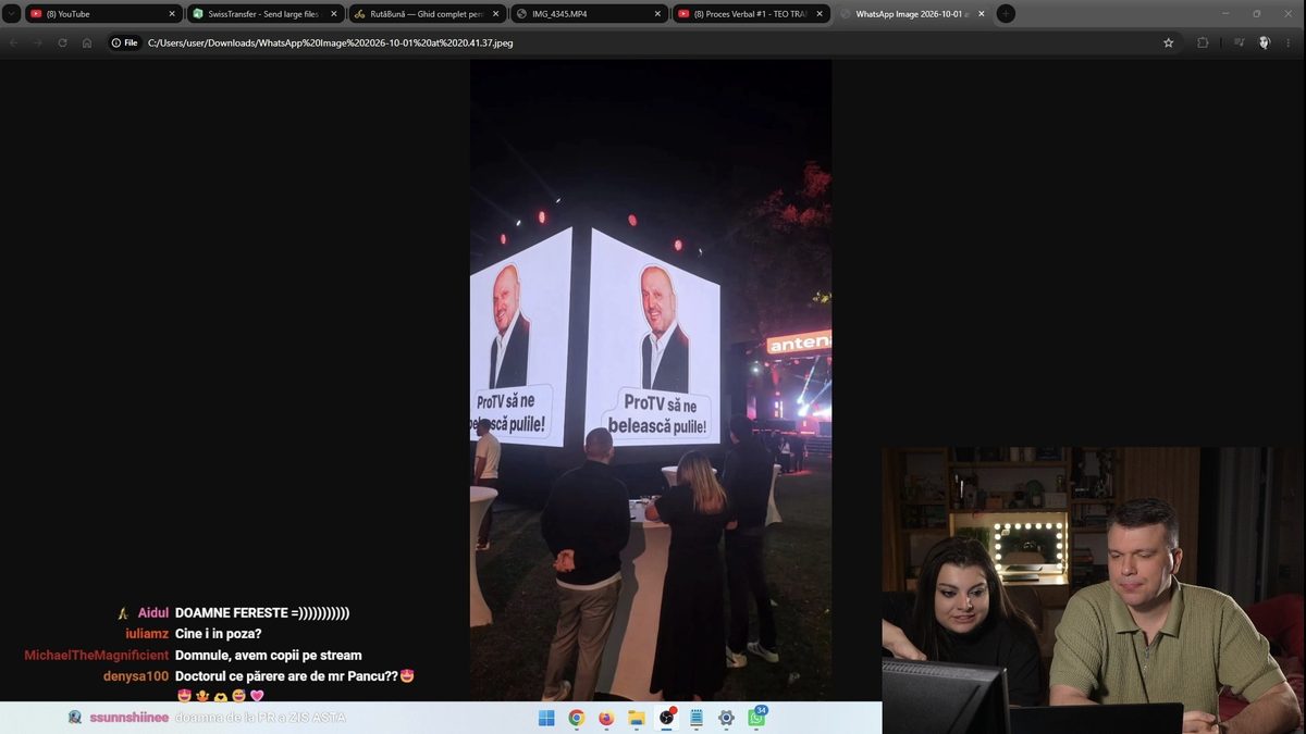 Captură de ecran din live-ul de pe Twitch: cei doi realizatori, în colțul din dreapta jos, comentează o fotografie cu un ecran uriaș de la un eveniment, iar în stânga curg mesajele din chat